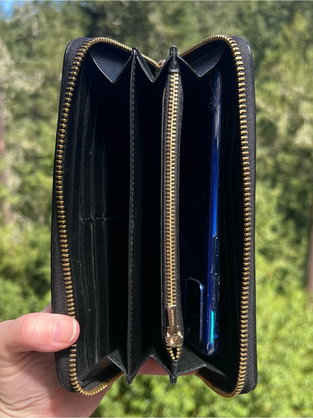 Coach accordion zip